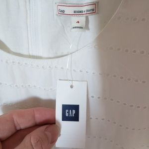 GAP Dresses - NWT white eyelet dress with pockets from the Gap GAP Dresses - NWT white eyelet dress with pockets from the Gap